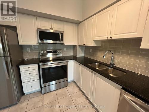 Ph1-01 - 1215 Bayly Street, Pickering, ON - Indoor Photo Showing Kitchen With Double Sink