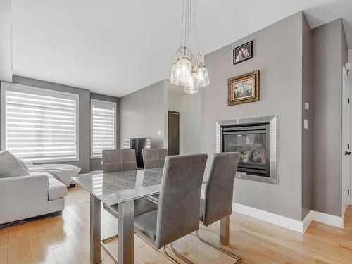 Dining room - 2340 Rue Des Francs-Bourgeois, Boisbriand, QC - Indoor With Fireplace