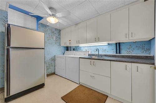 Laundry room with double sink - 190 Annabelle Street, Hamilton, ON - Indoor