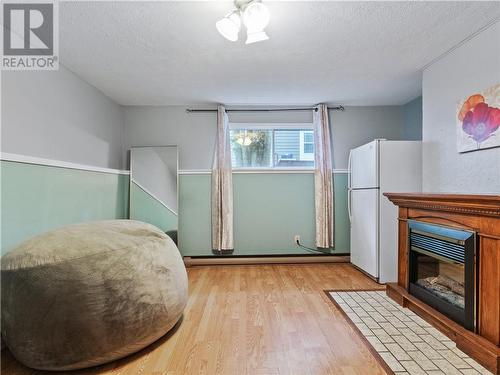 88 Woodleigh Street, Moncton, NB - Indoor Photo Showing Other Room With Fireplace