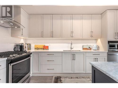 4380 Lakeshore Road Road Unit# Ph10, Kelowna, BC - Indoor Photo Showing Kitchen With Double Sink