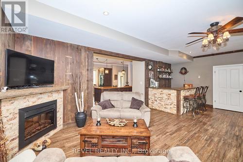 9695 Grassy Brook Road, Niagara Falls, ON - Indoor Photo Showing Living Room With Fireplace