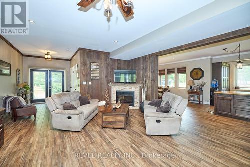 9695 Grassy Brook Road, Niagara Falls, ON - Indoor Photo Showing Living Room With Fireplace