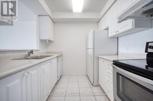 705 - 2628 Mccowan Road, Toronto (Agincourt North), ON - Indoor Photo Showing Kitchen With Double Sink