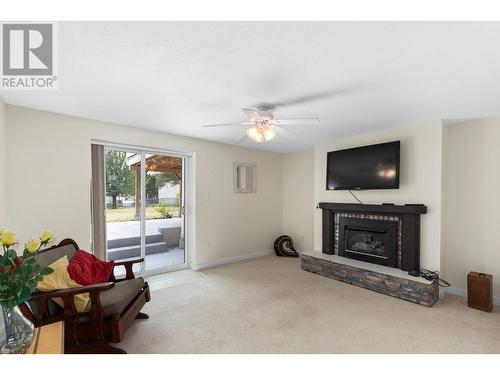 2169 Peters Road, West Kelowna, BC - Indoor Photo Showing Living Room With Fireplace