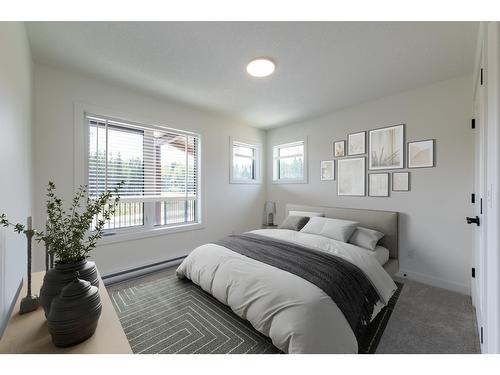 5 - 1444 Granite Drive, Golden, BC - Indoor Photo Showing Bedroom