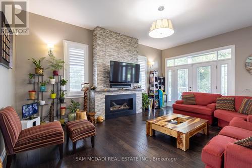 187 Beach Boulevard, Hamilton (Hamilton Beach), ON - Indoor Photo Showing Living Room With Fireplace