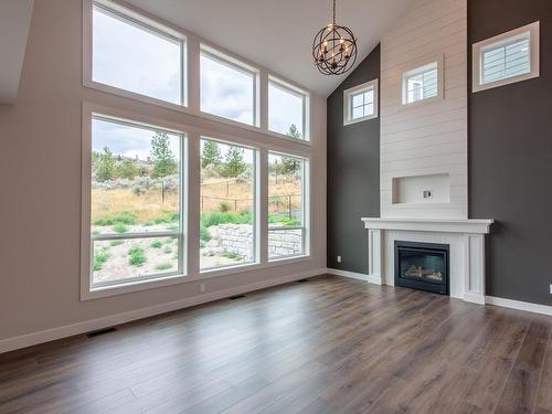 8759 Badger Drive, Kamloops, BC - Indoor Photo Showing Other Room With Fireplace