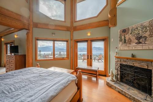 3700 Partridge Road, Naramata, BC - Indoor Photo Showing Bedroom With Fireplace