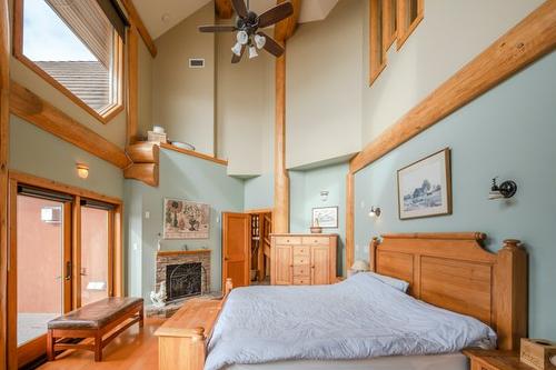 3700 Partridge Road, Naramata, BC - Indoor Photo Showing Bedroom With Fireplace