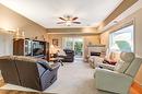 102-2300 Benvoulin Road, Kelowna, BC  - Indoor Photo Showing Living Room With Fireplace 