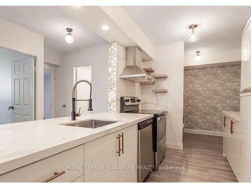 105-320 Dixon Rd, Toronto, ON - Indoor Photo Showing Kitchen With Upgraded Kitchen