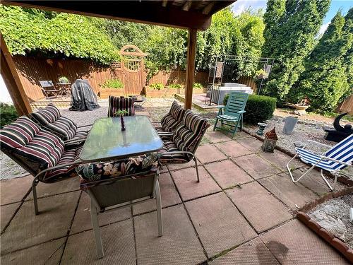 Lower patio off the lower 3rd level dining room - 16 Flamingo Drive, Hamilton, ON - Outdoor With Deck Patio Veranda