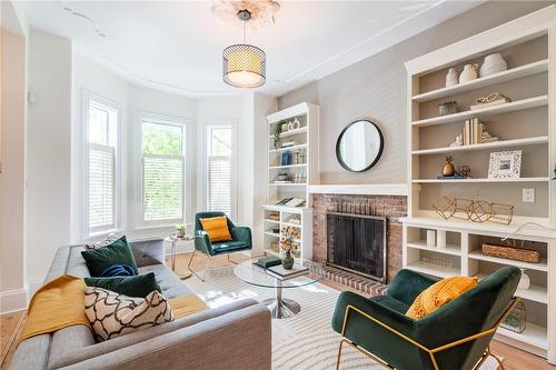 24 Bruce Street, Hamilton, ON - Indoor Photo Showing Living Room With Fireplace