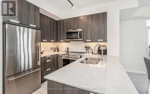 1213 - 35 Watergarden Drive, Mississauga (Hurontario), ON - Indoor Photo Showing Kitchen With Double Sink With Upgraded Kitchen