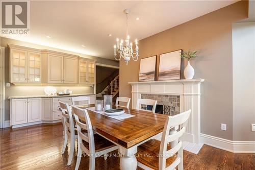 4014 Lantern Lane, Burlington (Shoreacres), ON - Indoor Photo Showing Dining Room With Fireplace