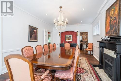 13 Freeman Place, Hamilton (Durand), ON - Indoor Photo Showing Dining Room With Fireplace