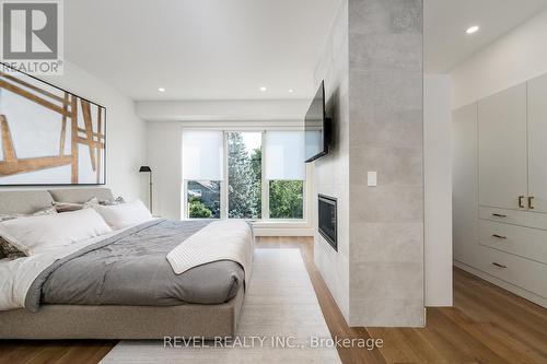 6 - 1397 York Road, Niagara-On-The-Lake, ON - Indoor Photo Showing Bedroom With Fireplace