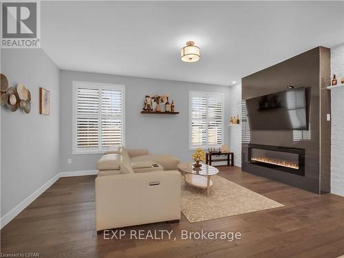 2290 Tokala Trail, London, ON - Indoor Photo Showing Living Room With Fireplace