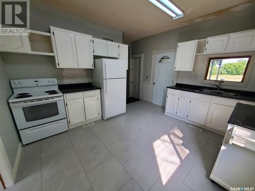 308 Main Street, Carlyle, SK - Indoor Photo Showing Kitchen With Double Sink