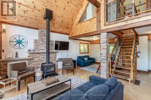 9 Philpark Road, Tiny, ON - Indoor Photo Showing Living Room With Fireplace