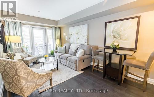 102 - 1045 Nadalin Heights, Milton (Willmott), ON - Indoor Photo Showing Living Room