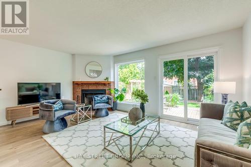 5027 Northern Lights Circle, Mississauga (Hurontario), ON - Indoor Photo Showing Living Room With Fireplace