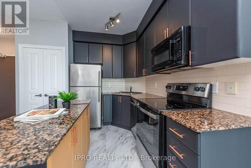 2008 - 225 Webb Drive, Mississauga (City Centre), ON - Indoor Photo Showing Kitchen With Upgraded Kitchen