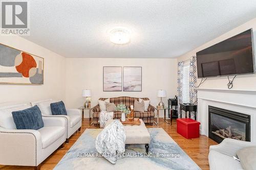 33 Bloom Drive, Brampton (Bram East), ON - Indoor Photo Showing Living Room With Fireplace