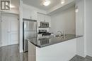 232 - 35 Southshore Crescent, Hamilton (Stoney Creek), ON  - Indoor Photo Showing Kitchen With Stainless Steel Kitchen With Double Sink 