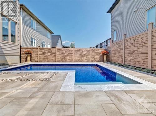 107 Dun Skipper Drive, Ottawa, ON - Outdoor With In Ground Pool