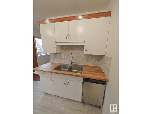 10416 86 Av Nw Nw, Edmonton, AB - Indoor Photo Showing Kitchen With Double Sink