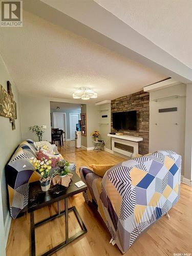 421 6Th Avenue E, Prince Albert, SK - Indoor Photo Showing Living Room With Fireplace