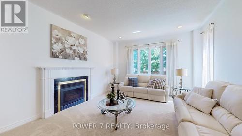 295 Calvert Road, Markham (Cachet), ON - Indoor Photo Showing Living Room With Fireplace