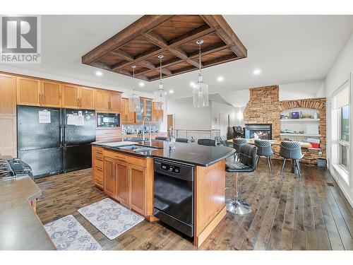 1720 Morrison Road, Kelowna, BC - Indoor Photo Showing Kitchen With Fireplace