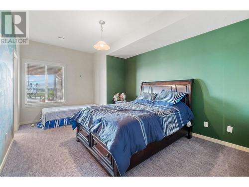 1720 Morrison Road, Kelowna, BC - Indoor Photo Showing Bedroom