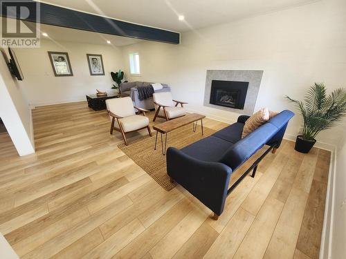 1755 Mountain  Street, Fruitvale, BC - Indoor Photo Showing Other Room With Fireplace