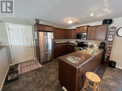 5641 Birch Drive, Fort Nelson, BC - Indoor Photo Showing Kitchen With Double Sink