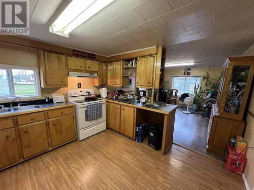 14 4603 S 50 Avenue, Fort Nelson, BC - Indoor Photo Showing Kitchen With Double Sink