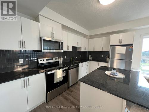 0212 - 1101 Lackner Boulevard, Kitchener, ON - Indoor Photo Showing Kitchen With Stainless Steel Kitchen With Upgraded Kitchen