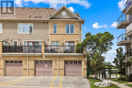 1 - 3010 Erin Centre Boulevard, Mississauga (Churchill Meadows), ON - Outdoor With Balcony With Facade