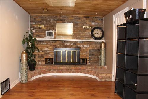 Great shape brick fireplace - 23 Lamb Court, Hamilton, ON - Indoor Photo Showing Other Room