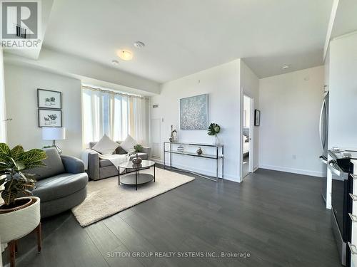 1010 - 3200 William Coltson Avenue, Oakville, ON - Indoor Photo Showing Living Room