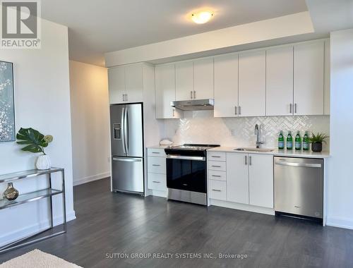 1010 - 3200 William Coltson Avenue, Oakville, ON - Indoor Photo Showing Kitchen With Upgraded Kitchen