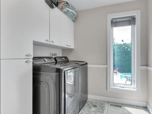 Laundry room - 252 Rue De Pigalle, Repentigny (Repentigny), QC - Indoor Photo Showing Laundry Room