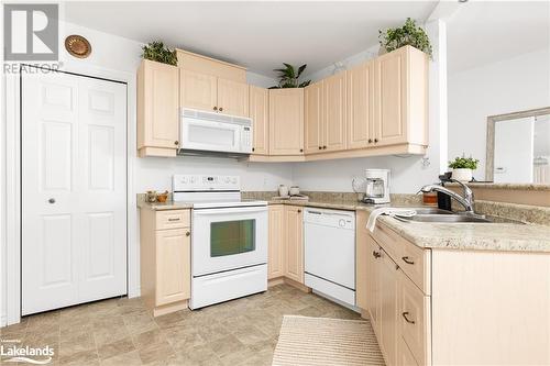 24 Dairy Lane Unit# 206, Huntsville, ON - Indoor Photo Showing Kitchen With Double Sink