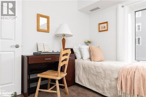 24 Dairy Lane Unit# 206, Huntsville, ON - Indoor Photo Showing Bedroom