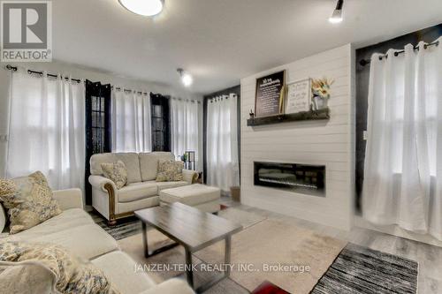 431 Broadway Street, Tillsonburg, ON - Indoor Photo Showing Living Room With Fireplace