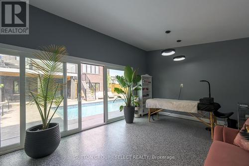 83 Daventry Way, Middlesex Centre (Kilworth), ON - Indoor Photo Showing Other Room With In Ground Pool