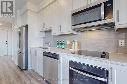 418 - 600 North Service Road, Hamilton (Lakeshore), ON - Indoor Photo Showing Kitchen With Stainless Steel Kitchen